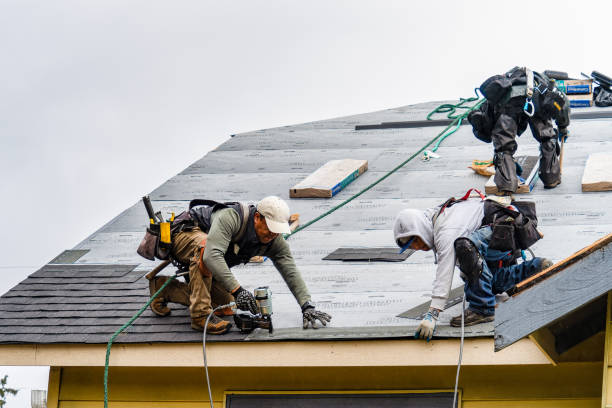 Professional Gutter Installation technician working in Middle Island, NY